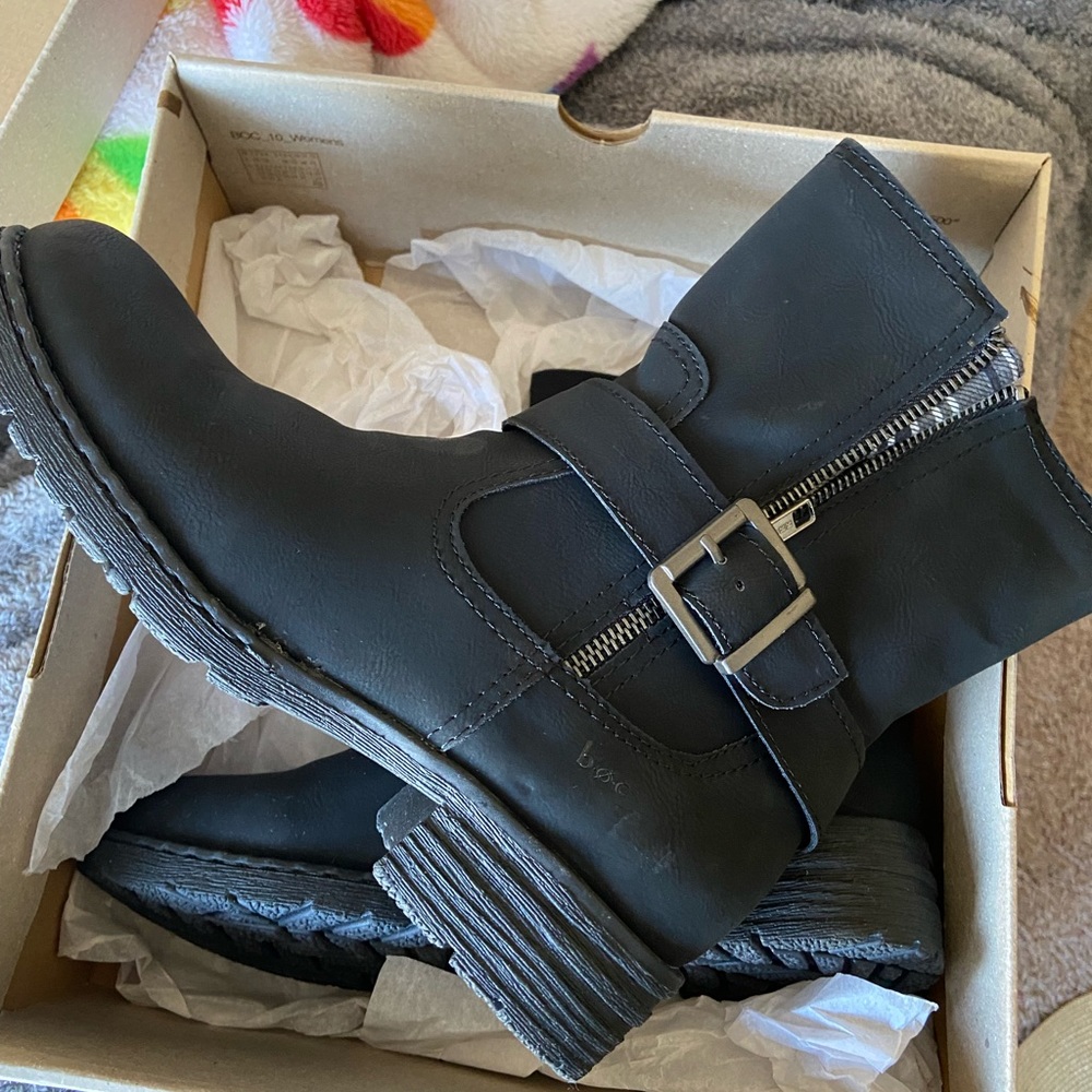 Black ankle boots with accent buckle